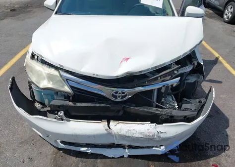 2014 Toyota Camry Le z USA, uszkodzony, nr VIN 4T4BF1FKXER415883